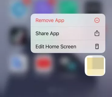 Tap and hold on the app you want to delete until the context menu appears