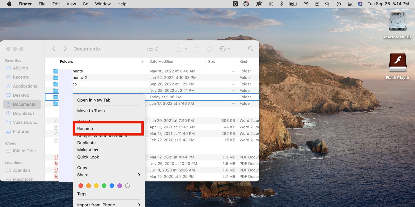 Renaming a new folder in Documents on a Mac by choosing the Rename option on the file menu.